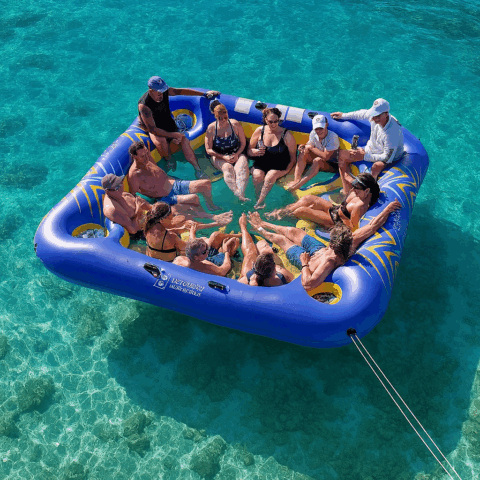 Inflatable Party Island a group of people hanging out on an Inflatable Party Island